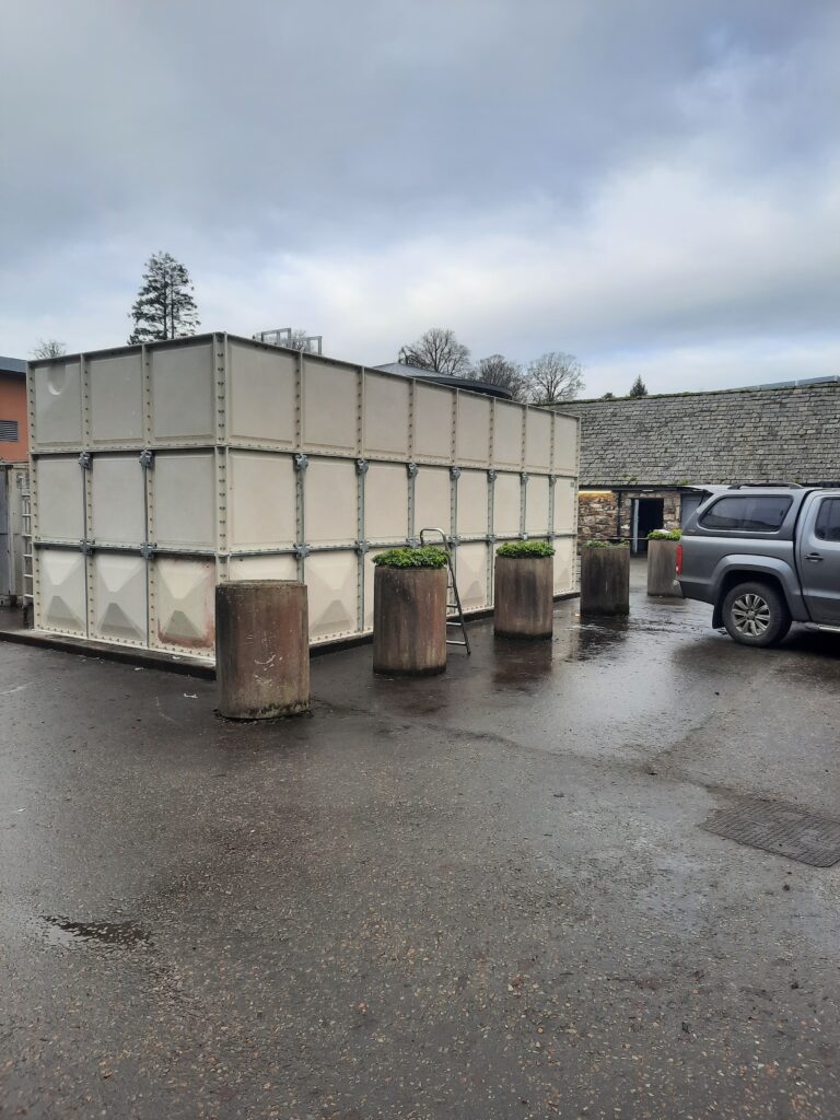An image of a sectional cold water storage tank, demonstrating its sturdy construction and efficient design for water storage solutions.